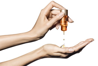 Press the bottom of the booster to release 3 - 5 drops